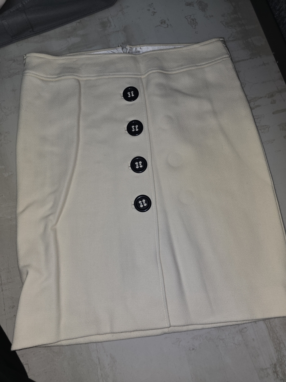 Dolce & Gabbana Cream Mini Skirt with Black Buttons